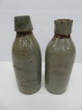Two Stoneware bottles, Grisbaum & Kehrein, 7 1/4