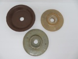 Three stoneware churn lids, 7