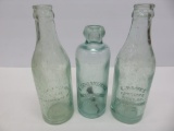 Three Oconomowoc bottles, crown and Hutch