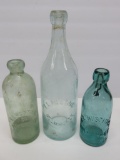 Three EL Husting bottles, hutch and applied top, 7