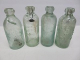 Four Milwaukee and Waukesha hutch bottles