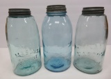 Three Atlas 1/2 gallon jars with zinc lids, blue