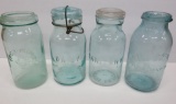 Four examples of blue canning jars, Sanitary, Fruit Keeper, Daisy and Star Glass, quart jars