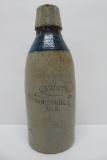EL Hustings Milwaukee WIS stoneware bottle, blue banded, 8