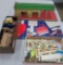 Train and car layout toys, wood blocks and metal gas station, plastic cars and accessories