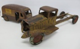 Two vintage metal trucks, Better Place van and early truck