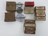 Vintage boxed spark plugs and gas tank covers