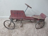 Antique wood pedal tractor