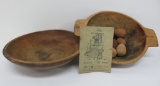 Two wooden bowls, wood eggs and early cookbook