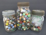Two pint jars and quart jar of vintage marbles, machine made