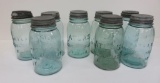 Eight Quart Atlas shoulder jars, blue/green with zinc lids