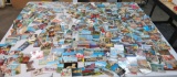 About 700+ travel postcards, 1950's to 1970's and scrapbook