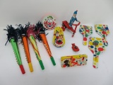 Vintage noise makers and wind up tin clown toy