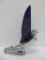 Flying Lady hood ornament with cobalt wings, 9