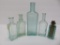 Five aqua medicine bottles, 3 1/2