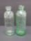 Two green Hutchinson bottles, Milwaukee, Standard and Schlomer, 7 1/2