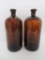 Two large Amber duraglass bottles, 13 1/2