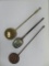 Three long handled metal utensils