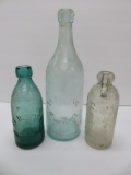 Three styles of EL Husting bottles