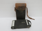 Eastman Kodak Jr folding camera, Model A and leather case, Marshall Fields tag on side