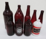 8 Ruby Red beer bottles and Carling Black Label milk glass bottle