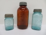 Three square Ball jars, aqua and amber