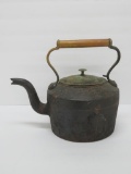Cast iron and brass handled tea kettle, 10