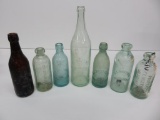 Seven assorted Hustings bottles