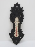 Cast iron cherub thermometer, 11 1/2