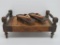wood foot stool and pair of wooden shoes