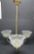 Brass ceiling light fixture with three etched glass shades, ornate