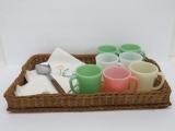 Fire King mugs, wicker tray and table linens