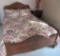 Wooden carved bed with adjustable mattress and bedding