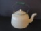 Green and cream enamel graniteware tea kettle