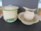 Cream and Green enamelware graniteware wash group, pitcher and bowl and covered pail