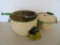 Cream and Green enamelware graniteware kettles, green handle strainer and corn sheller