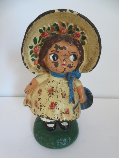 Vintage Cast Iron google eyed sun bonnet girl door stop, 7 1/2"