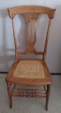 Lovely press carved lyre back chair with cane seat