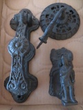 Cast iron door knockers and candle stand