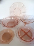 Five pieces of pink depressionn glass, bowls and plates