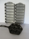 Two wearever aluminum cornstick pans and cast iron Aebleskiver