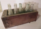 Wooden box with assorted soda bottles