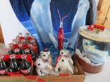 Assorted Coca Cola collectibles, bottles, bears, tin, and blanket