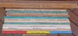 Assorted wooden yard sticks and rulers, advertising, about 16 pieces