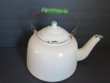 Cream and green enamel tea kettle with wood bail handle, 9