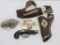 Vintage cap guns, gun lighter and plastic badges