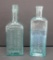 Two vintage medicine bottles, aqua green, Dr Rogers and Rawleigh's, 8