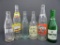 Six vintage soda bottles, 7 oz and 10 oz