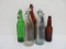 Six colored bottles, beer and wine