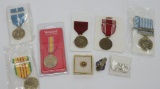 Lot of military medals and pins, some still in packages